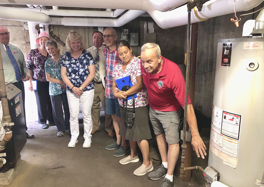 group of people admiring new boiler