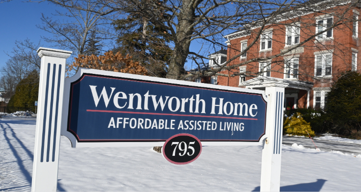 Wentworth Home Sign and Building 