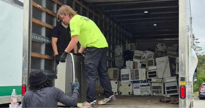 Workers loading truck
