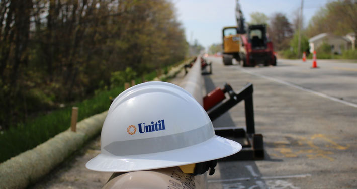 Unitil hard hat on natural gas pipeline