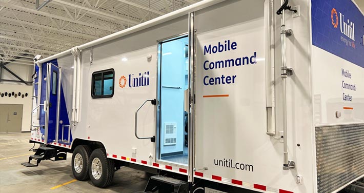 exterior of Unitil's new mobile command center in a large garage